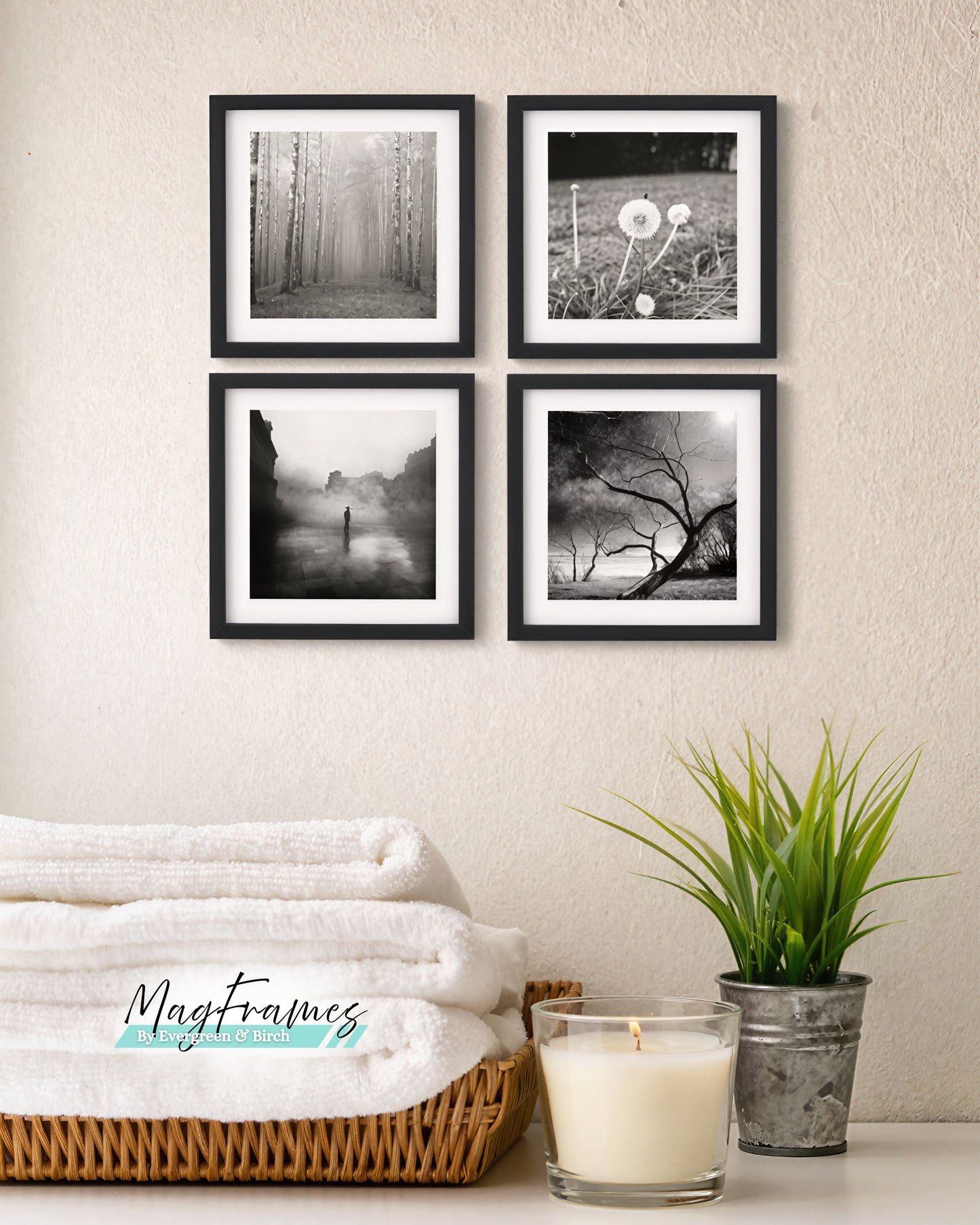 Black magnetic photo frames gallery wall with black and white prints in a modern bathroom setting
