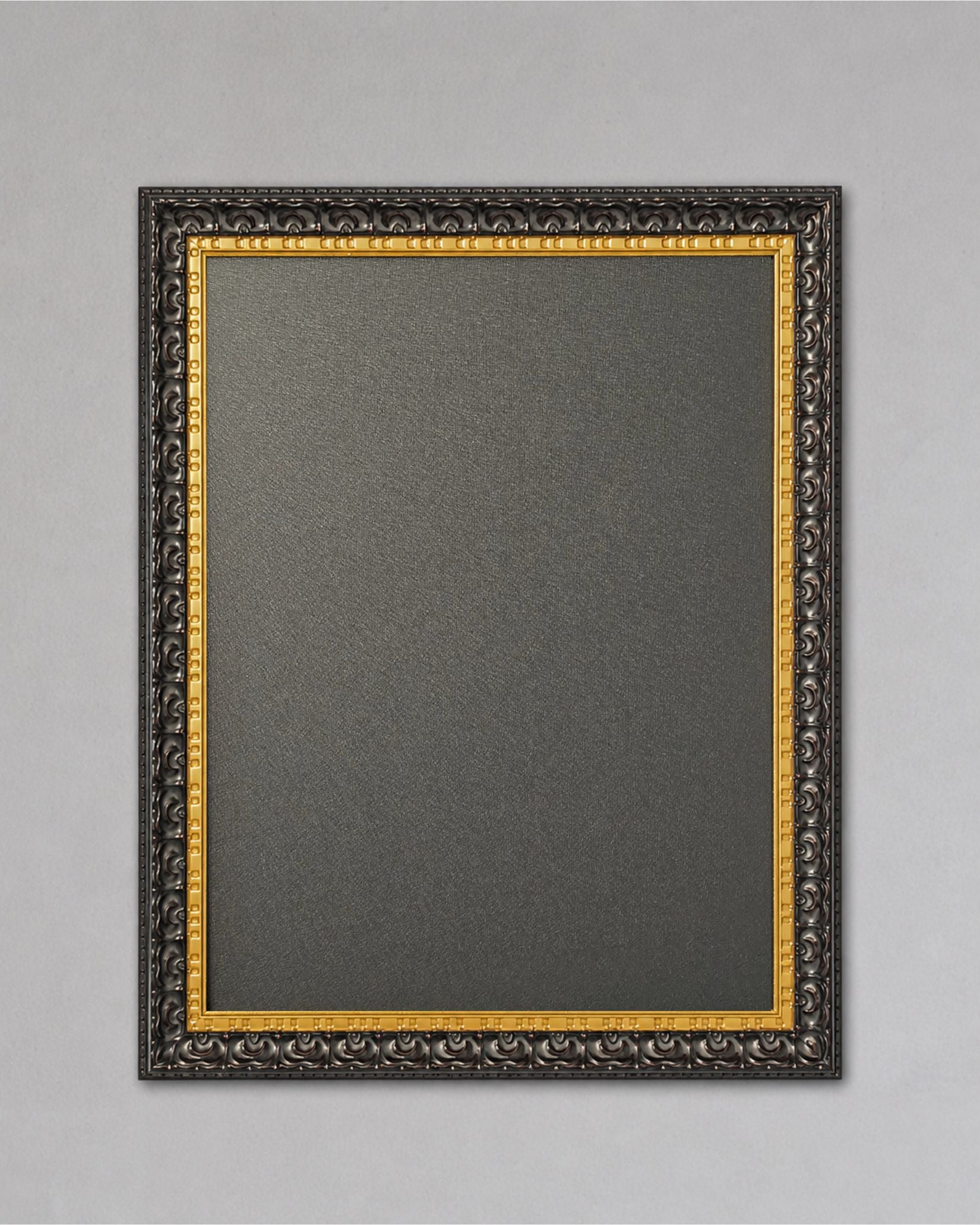 This 14x18 black and gold magnetic board features a textured magnetic steel surface inside an ornate solid wood frame displayed against a neutral gray wall background.