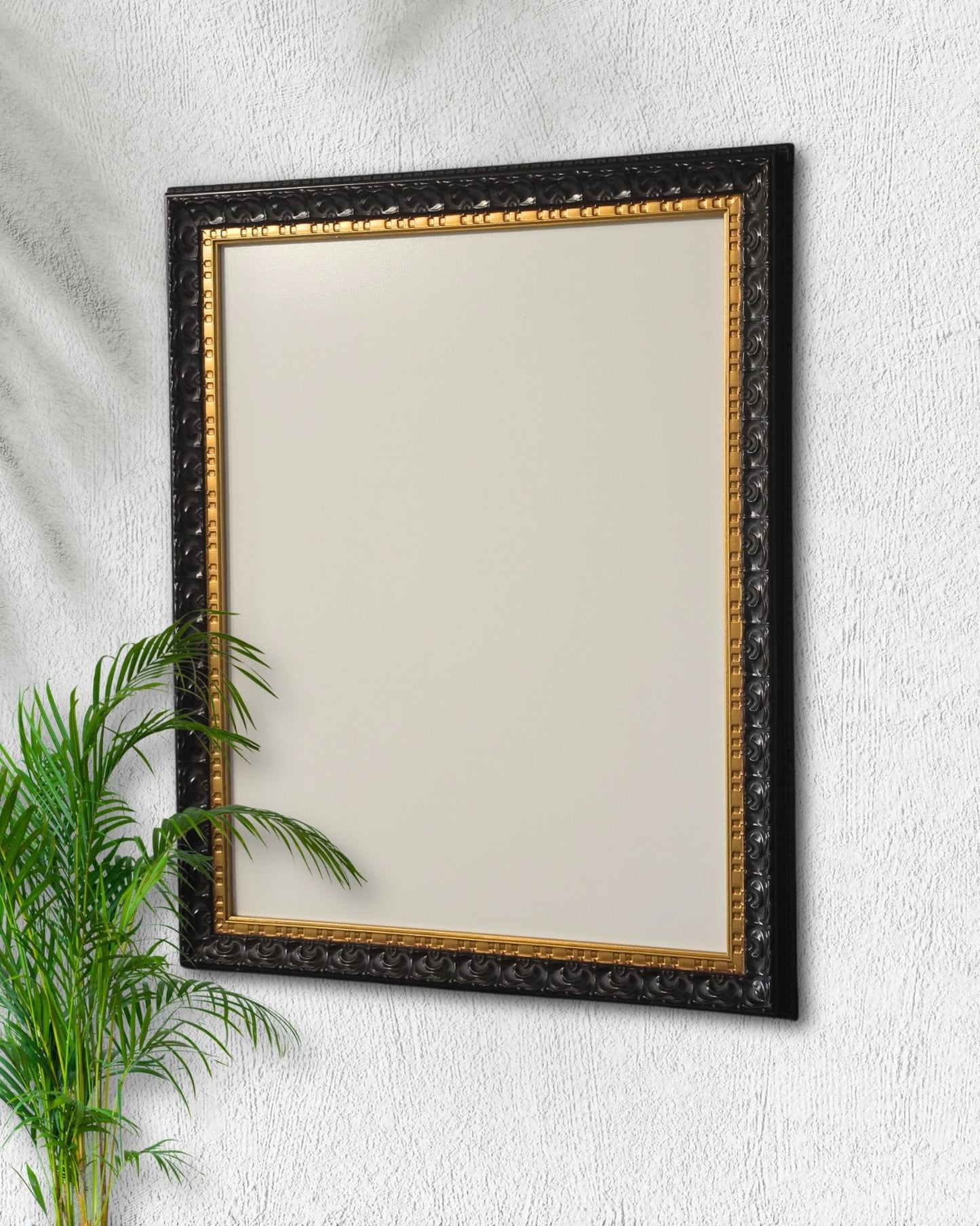 This 14x18 black and gold magnetic board features a vintage solid wood frame with a magnetic steel surface displayed on a textured white wall beside a green plant.