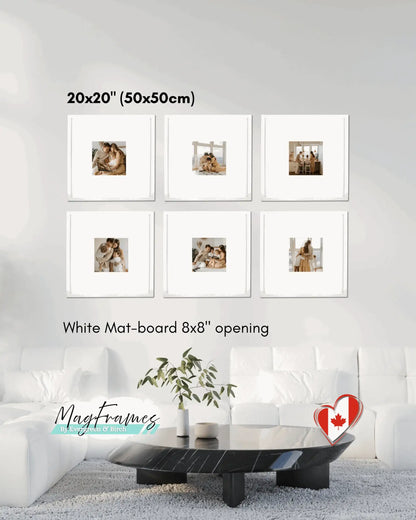 20x20 white magnetic photo frames with mat board and 8x8 opening creating a modern gallery wall in a living room.
