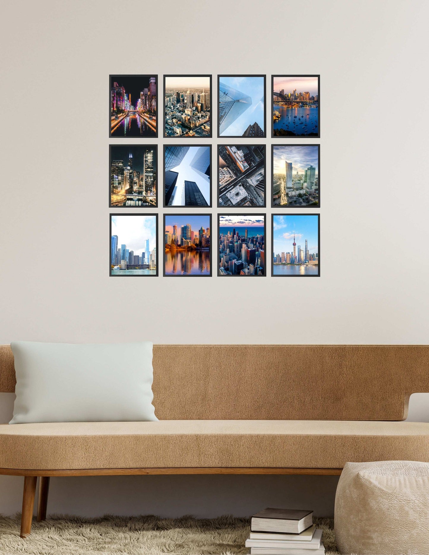 8x11 black magnetic peel and stick photo frames arranged as a modern city gallery wall above a neutral sofa.