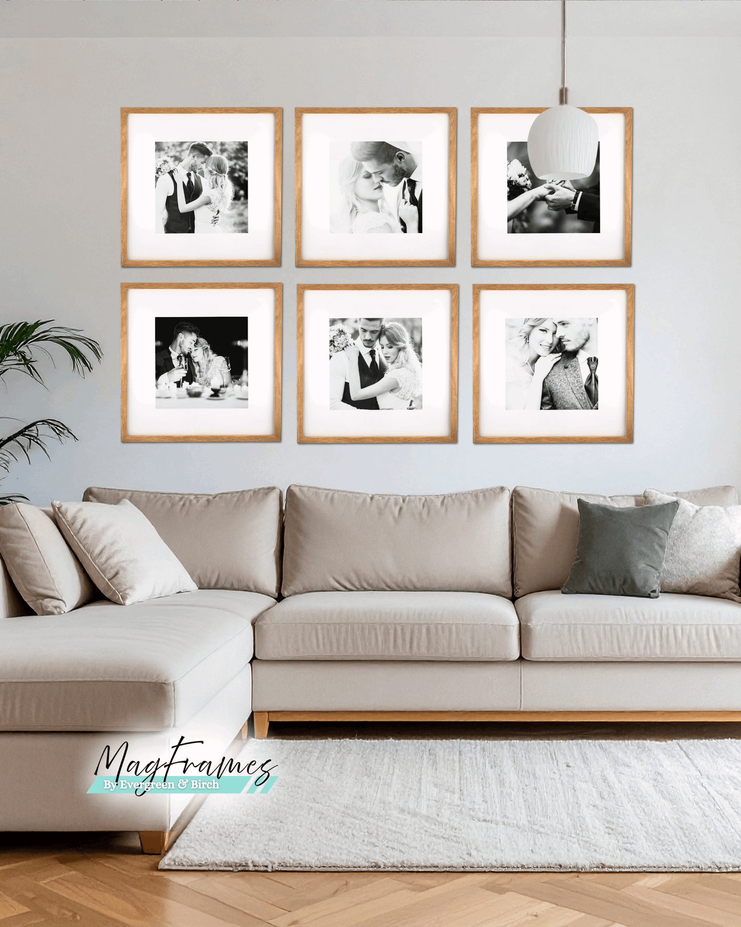 Natural oak MagFrames magnetic photo frames arranged in a 20x20 gallery wall above a beige sofa in a modern Scandinavian living room.