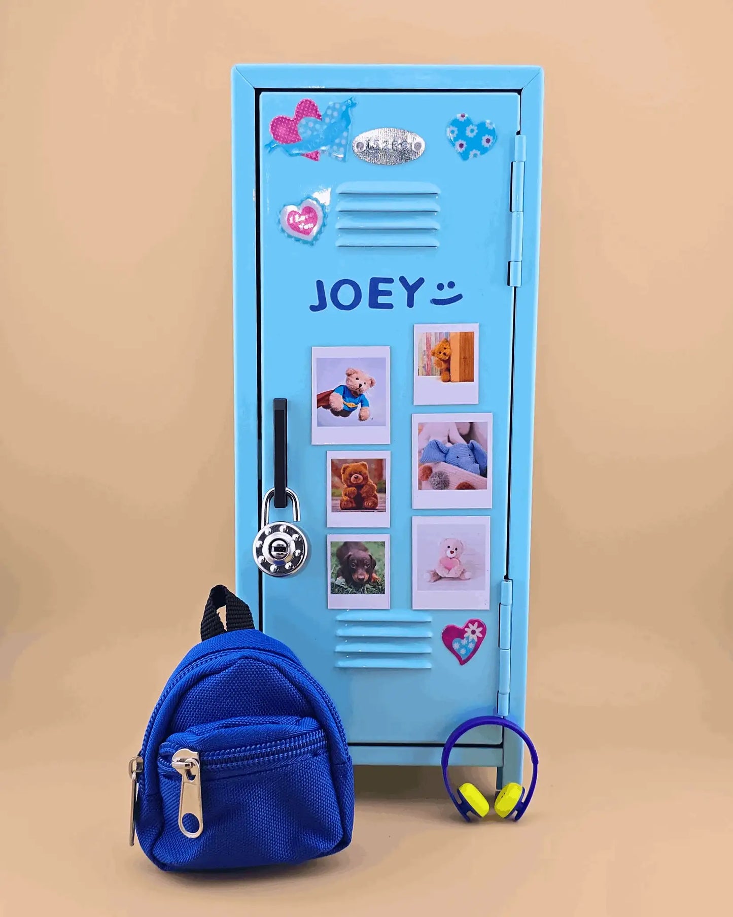 Personalized blue mini retro metal locker with name and photo magnets, styled as a kids desk organizer with mini backpack and headphones.