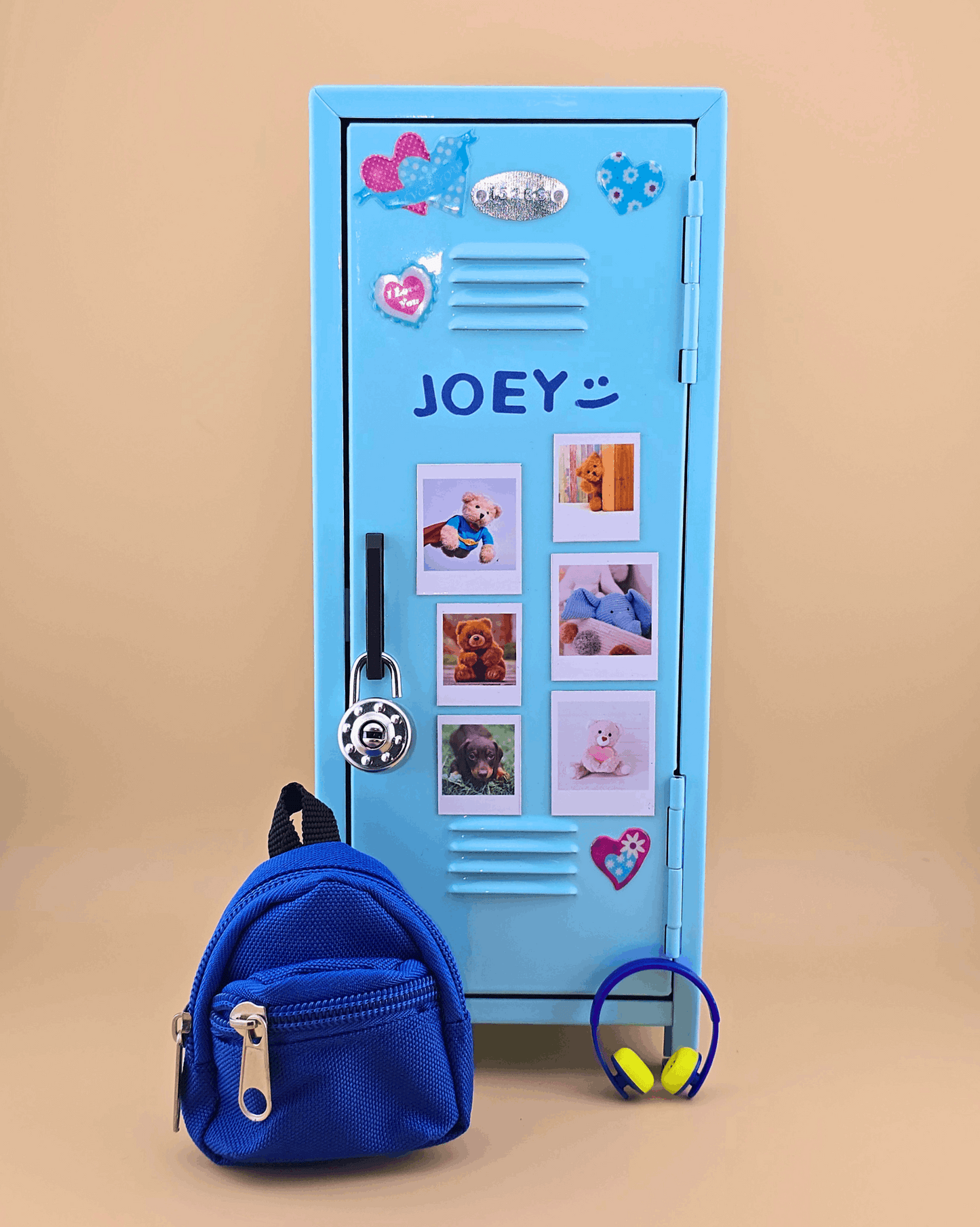 Personalized blue mini retro metal locker with name and photo magnets, styled as a kids desk organizer with mini backpack and headphones.