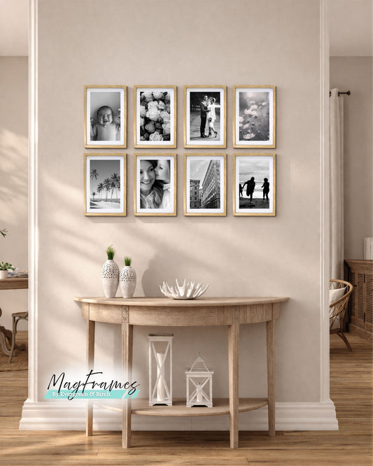 Oak magnetic photo frames gallery wall 8x12 with black and white photos in a modern hallway above a wooden console table
