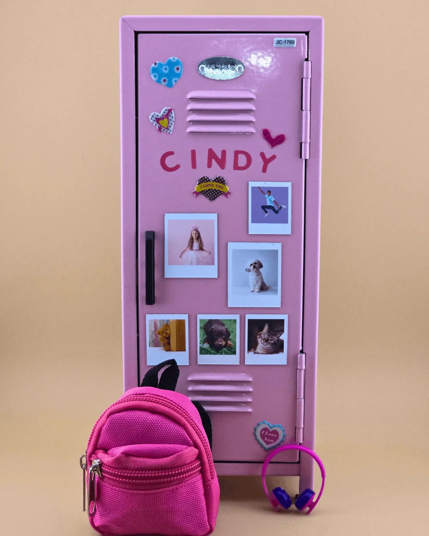 Personalized pink mini retro metal locker with name and photo magnets, styled as a kids desk organizer with mini backpack.