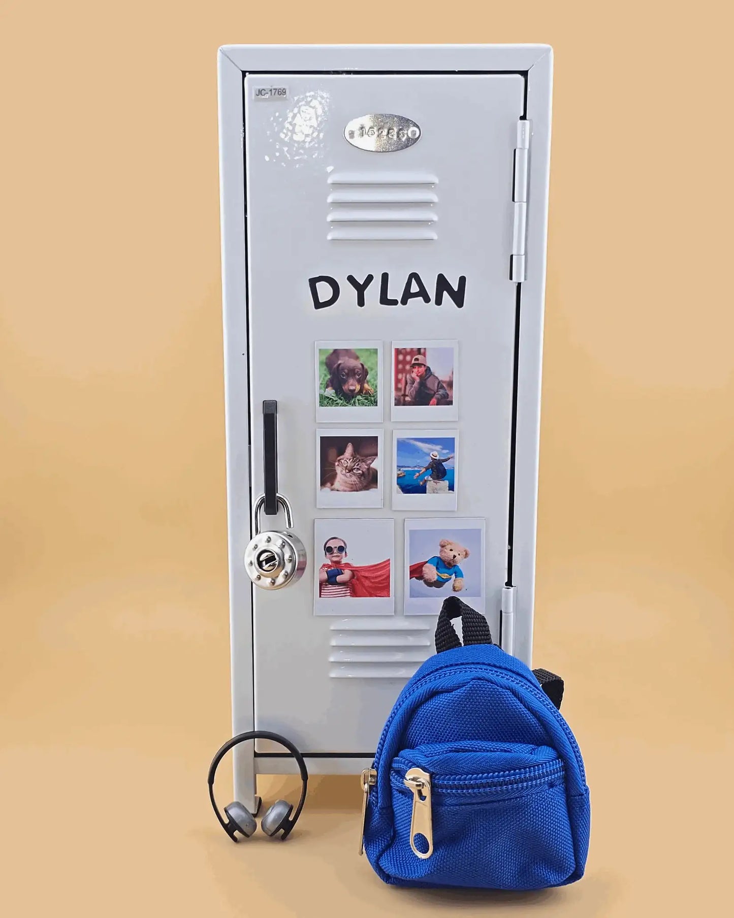 Personalized white mini retro metal locker with name and photo magnets, styled as a kids desk organizer with blue mini backpack.
