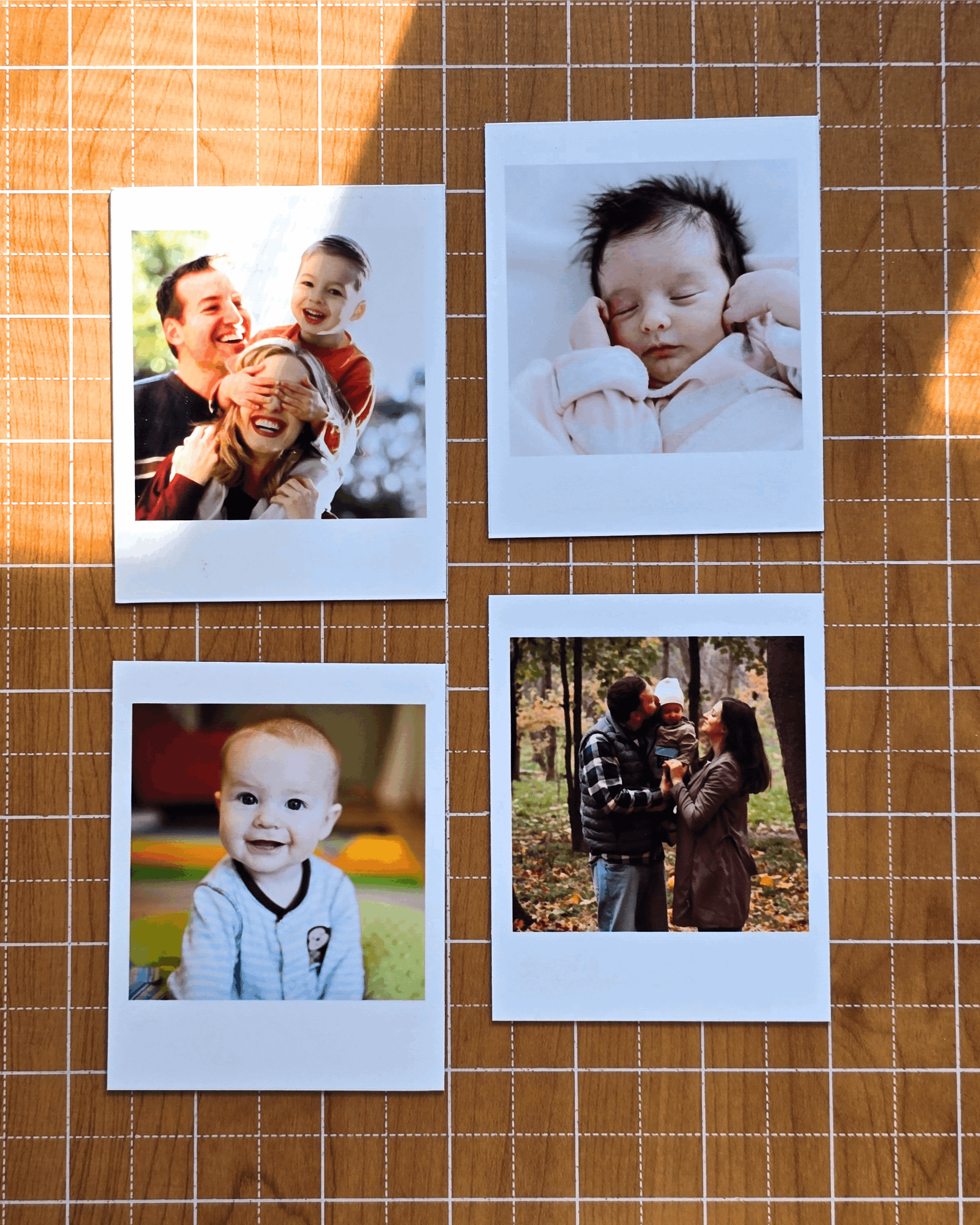 Vintage instant-style custom photo magnets arranged on wooden surface, showing classic retro white border design.