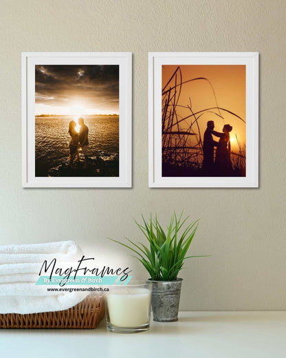 Two white magnetic peel and stick photo frames displaying sunset couple photos in a minimalist home setting.